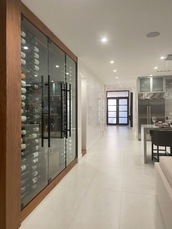 Hallway wine wall with glass doors