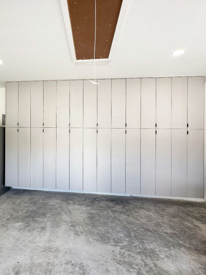 Wall of tall garage cabinets