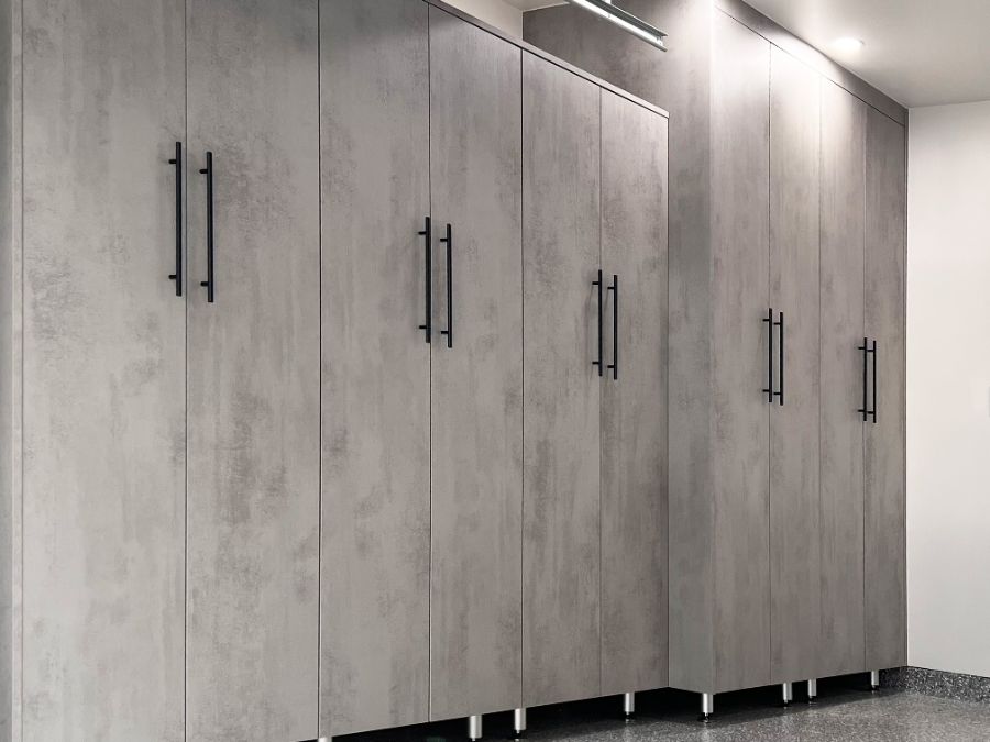 Tall concrete-gray cabinets